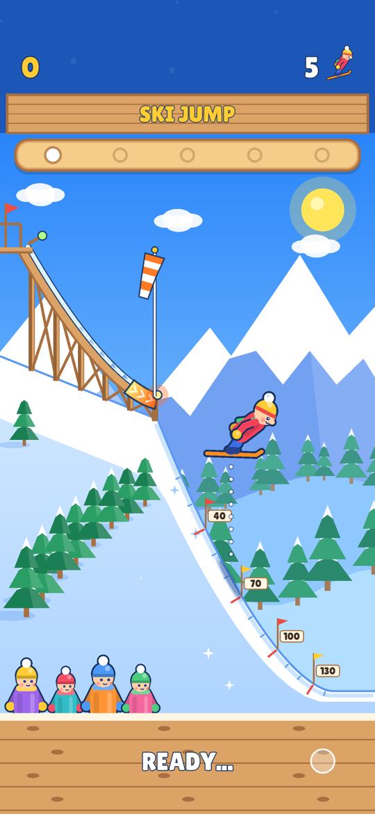 Ski Jump in the Mountains: a skier flies off the ramp, high over the snowy pines